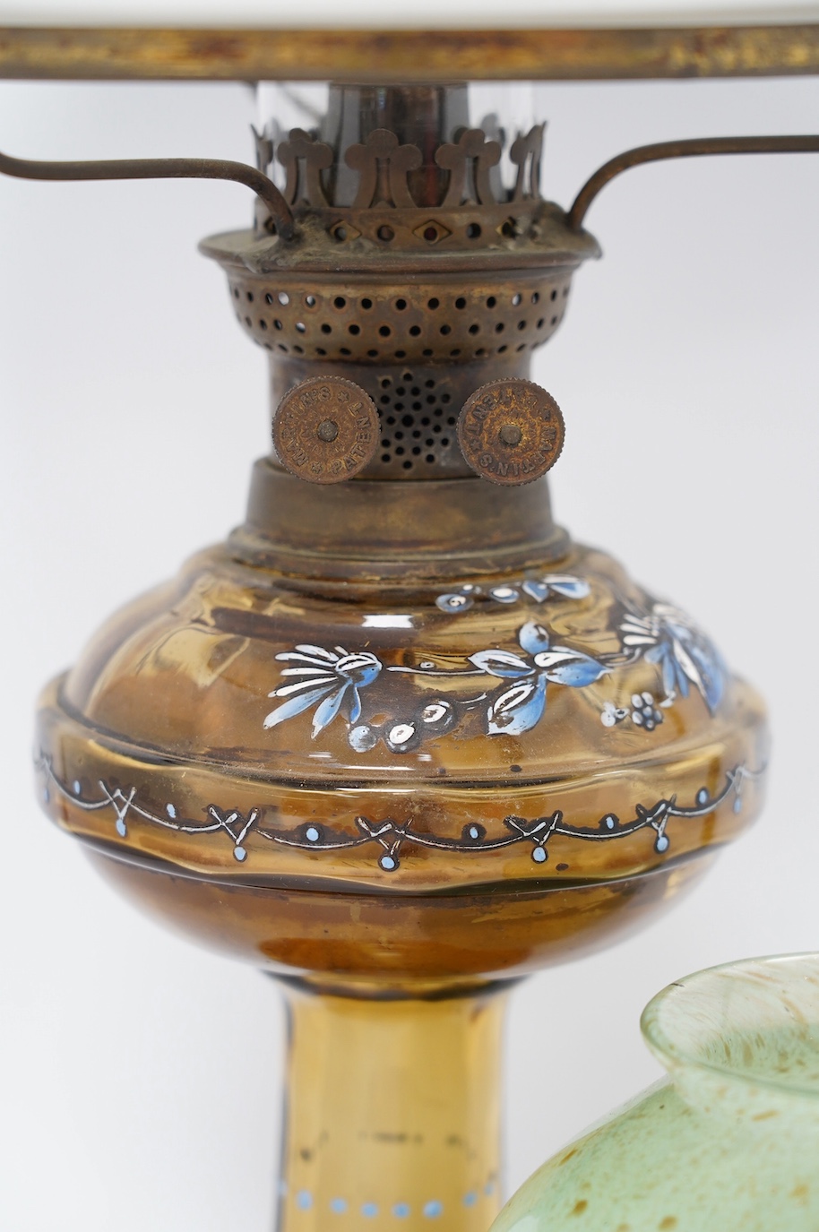 A Vasart glass vase, and an enamelled glass oil lamp, lamp 56cm high. Condition - both good